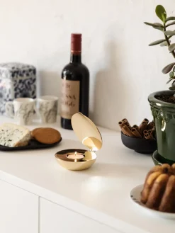 Portavelas Shell, latón